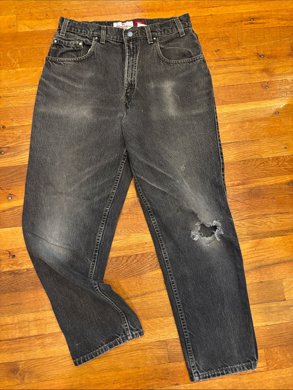 Levi's Black Relaxed Fit Jeans with Distressed Knee